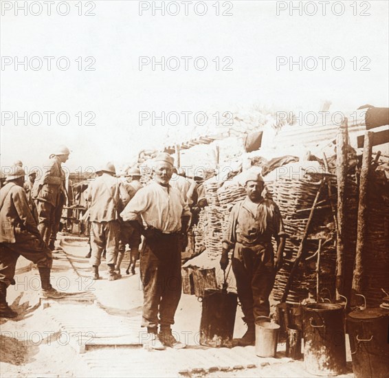 Soldiers in the trenches, Belgium, c1914-c1918. Artist: Unknown.