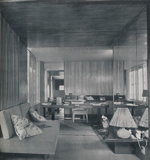 'Desk in bedroom-sitting room', 1942.  Artist: Unknown.