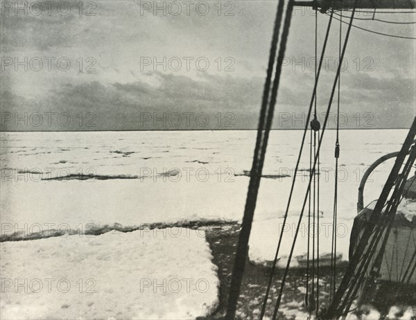 'Pushing Through Heavy Floes In the Ross Sea', c1908, (1909). Artist: Unknown.