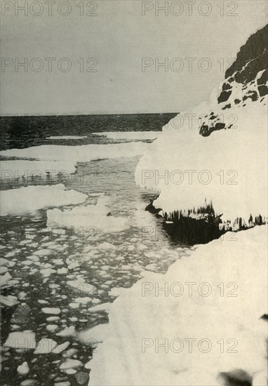 'The First Landing-Place, Showing Bay Ice Breaking Out and Drifting Away North', 1908, (1909). Artist: Unknown.