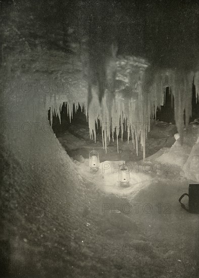 'An Ice Cavern in the Winter. Photographed by the Light of Hurricane Lamps', c1908, (1909).  Artist: Unknown.