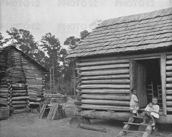 'Negro Log Huts', Thomasville, Georgia, USA, c1900. Creator: Unknown.