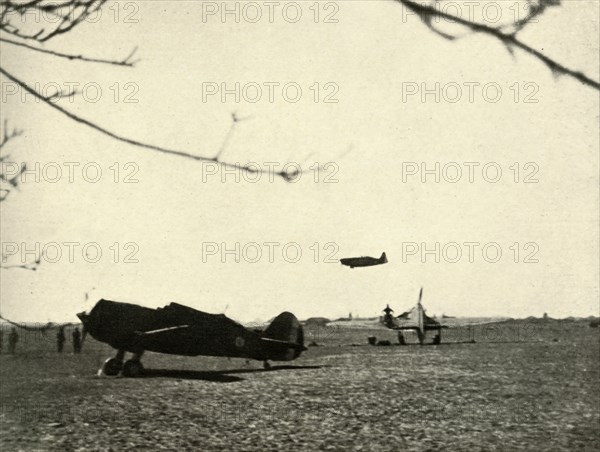 'Morane 406 at Vassincourt Aerodrome with French Curtiss Hawk and  Hurricane', 1939-1940, (1941). Creator: Unknown.