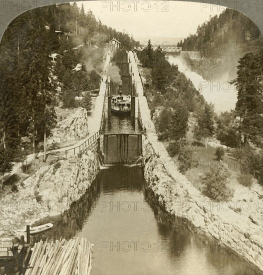 'Steamboat climbing a hill beside Vrang waterfall, by locks in  Bandak-Nordsjo, Norway', c1905. Creator: Unknown.