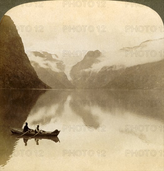 'On sombre Lake Olden, between cloud-covered mountains, to Maelkevold glacier, Norway', 1905. Creator: Unknown.