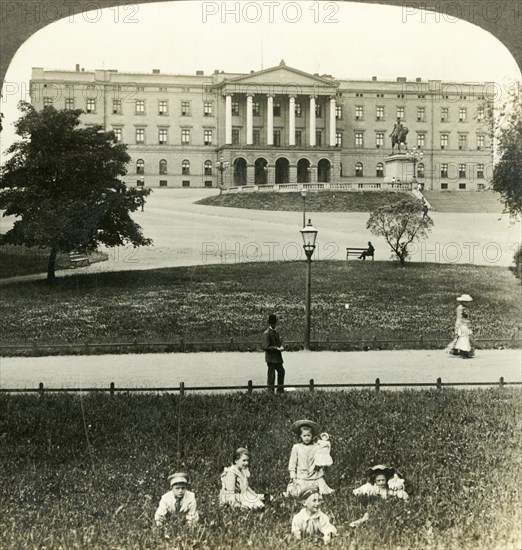 'The Royal Palace (S.E. facade) and statue of King Charles XIV. (Bernadotte) Christiania, Norway', c Creator: Unknown.