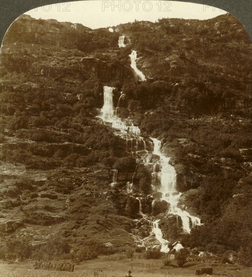 'Rustoen Falls, as they come out of the sky, above Rustoefjeld heights, Norway', c1905. Creator: Unknown.