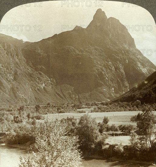 'Sharp pinnacles of Romdalshorn crowning mountain wall above Rauma river, Norway', c1905. Creator: Unknown.