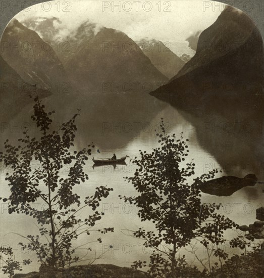 'Lake Loen - fed by glaciers on its cloud-capped mountain shores - Norway', c1905. Creator: Unknown.