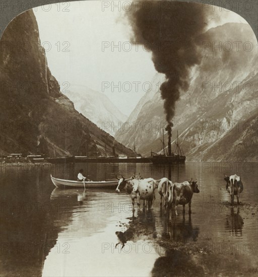 'Gudvangen's outlook over the Naerofjord where the sea reaches far in among the mountains, Norway',  Creator: Unknown.