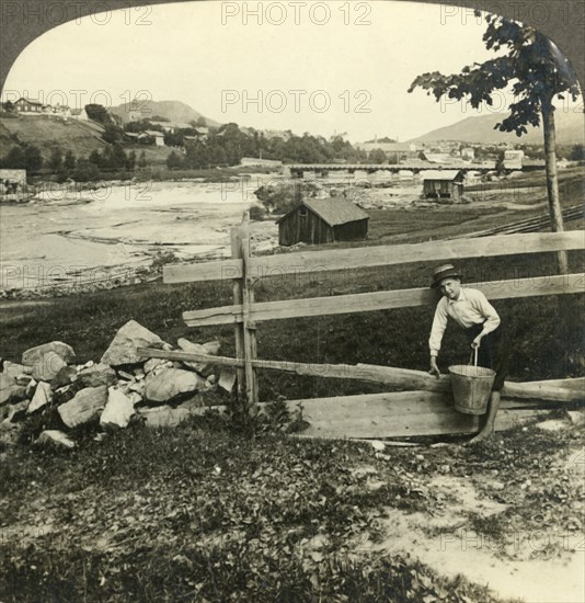 'Village church and homes of Kongsberg, beside the rapids of Laagen, Norway', c1905. Creator: Unknown.