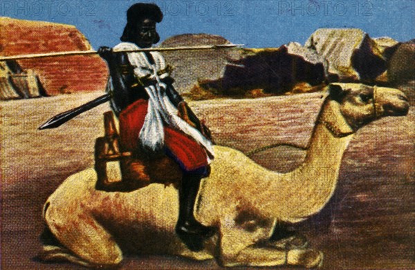 Sudanese warrior riding a camel, c1928. Creator: Unknown.