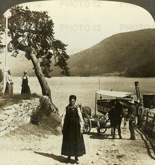'When the lake steamer calls at Tinoset pier - view across Tinsjo to the hills, Norwway', c1905. Creator: Unknown.