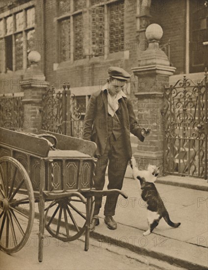'One of the Best-Established Trades: A Customer and the Cats-Meat Man', c1935. Creator: Donald McLeish.