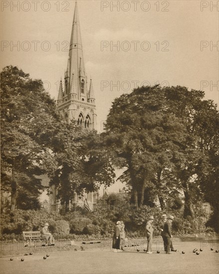 'Stoke Newington in Summer-Time: The Bowling Green at Clissold Park', c1935. Creator: Donald McLeish.