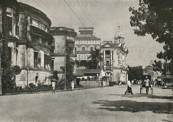 'Strand Road, Rangoon. - Post Office, Imperial Bank of India. Custom House in distance', 1900. Creator: Unknown.