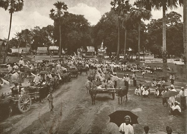 'Burmese Funeral. - Procession of Carts with Offerings', 1900. Creator: Unknown.