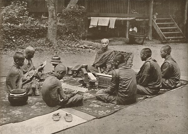 'Buddhist Priest with Pupils', 1900. Creator: Unknown.