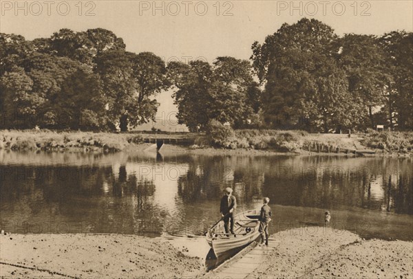 'London's River at Isleworth Ferry Looking Towards the Green Glades of Kew Gardens', c1935. Creator: Donald McLeish.