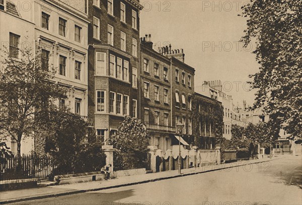 'Kensington Square Which Still Preserves The Peace of Two Centuries', c1935. Creator: Donald McLeish.