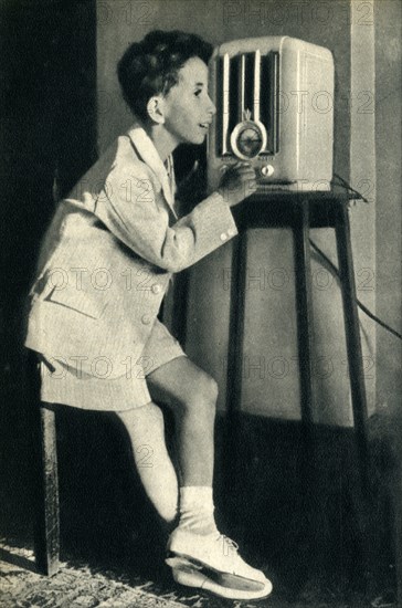 'King Faisal of Iraq listening to a broadcast prepared for his birthday by the BBC', 1942. Creator: Unknown.