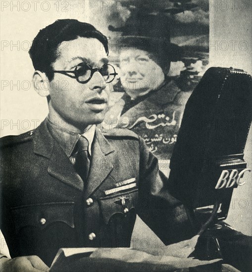 'He reads the news in Moroccan Arabic. A member of the Fighting French Army', 1942. Creator: Unknown.