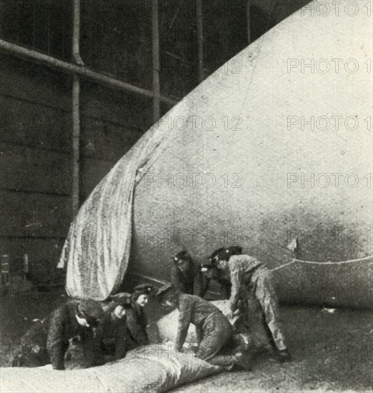 'Repairing Barrage Balloons', c1943. Creator: Cecil Beaton.