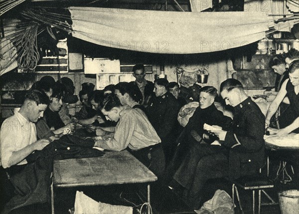 Royal Marines on their mess deck on board a ship, World War II, c1939-c1943 (1944). Creator: Unknown.