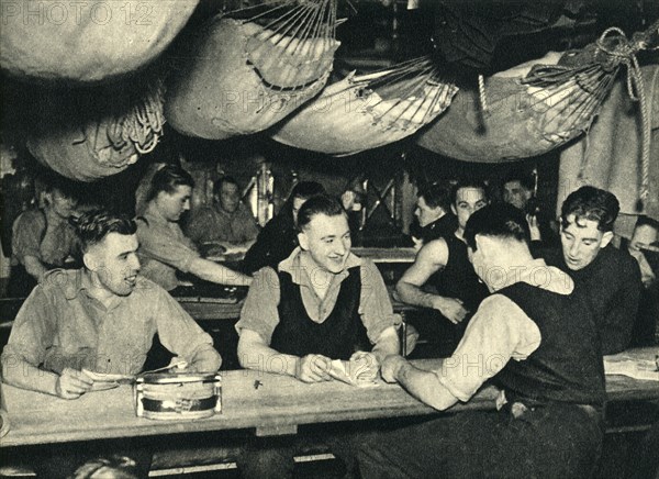 Royal Marines on their mess deck on board a ship, World War II, c1939-c1943 (1944). Creator: Unknown.