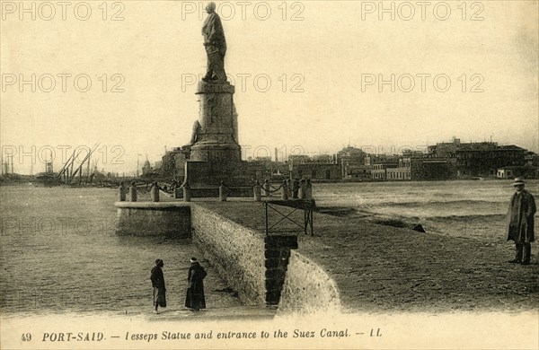 'Port Said. - Lesseps Statue and entrance to the Suez Canal - LL.', c1918-c1939. Creator: Unknown.