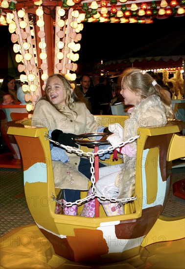 Children on a fairground ride, 2005