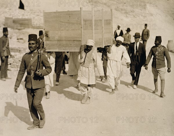 A chariot being removed from Tutankhamun's tomb, Valley of the Kings, Egypt, 1920s. Artist: Harry Burton