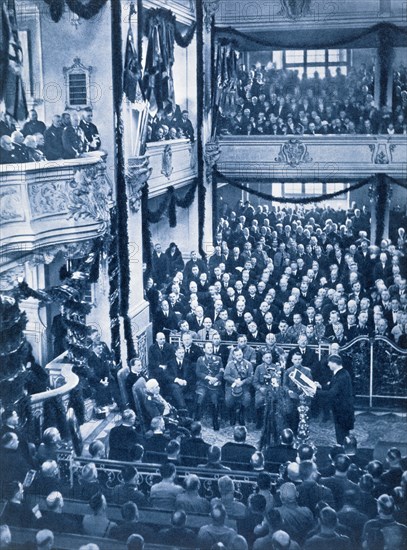 Adolf Hitler reads the Enabling Law in the Garrison Church at Potsdam, 21st March 1933. Artist: Unknown