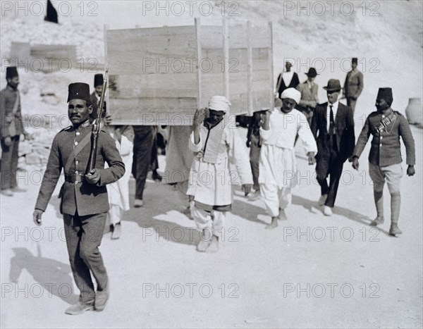 A chariot being removed from Tutankhamun's tomb, Valley of the Kings, Egypt, 1920s. Artist: Harry Burton