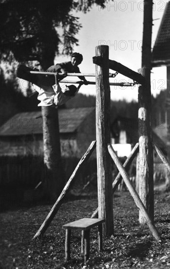 Children playing on a climbing frame, Bistrita Valley, Moldavia, north-east Romania, c1920-c1945. Artist: Adolph Chevalier