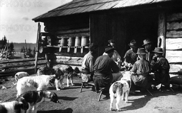 Shepherds taking a break for lunch, Bistrita Valley, Moldavia, north-east Romania, c1920-c1945. Artist: Adolph Chevalier