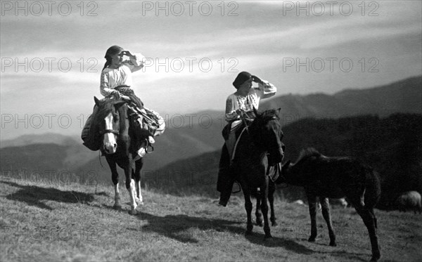 Two women on horseback, Bistrita Valley, Moldavia, north-east Romania, c1920-c1945. Artist: Adolph Chevalier