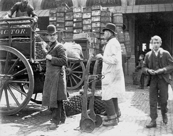 Unloading at Billingsgate Market, London, 1893. Artist: Paul Martin