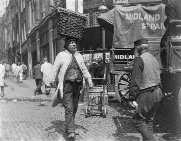 Fish porters at Billingsgate Market, London, 1893.  Artist: Paul Martin