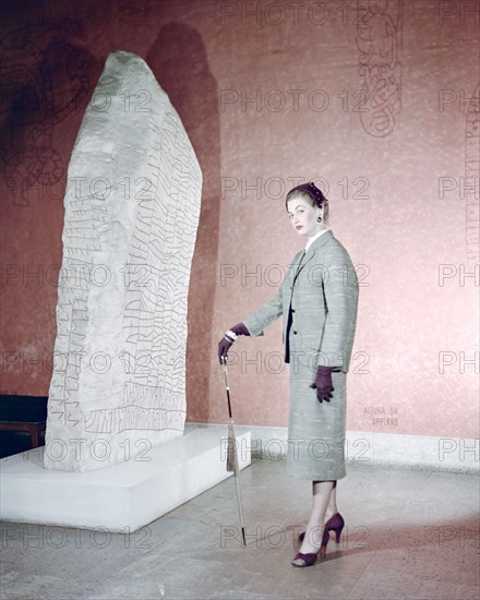 Female model shows a suit, the Historical Museum, Stockholm, 1950s. Artist: Göran Algård