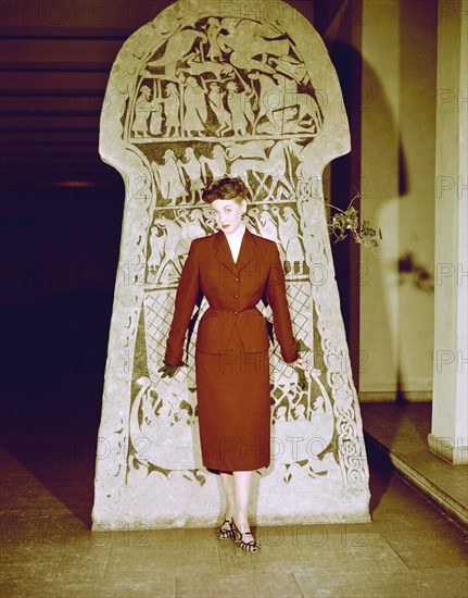 Female model shows a suit, the Historical Museum, Stockholm, 1950s. Artist: Göran Algård