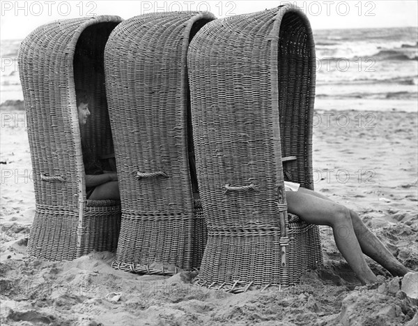 Basket shelters on a beach in Belgium, 1966.