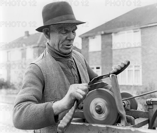 Gypsy knife-grinder, Horley, Surrey, 1964.