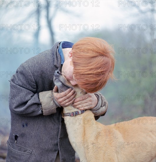 Gipsy boy with a dog, Charlwood, Newdigate area, Surrey, 1964.