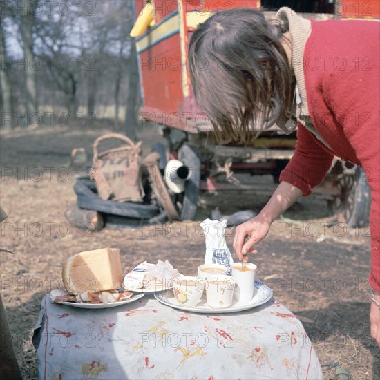 Gipsy woman making tea, Charlwood, Newdigate area, Surrey, 1964.