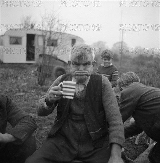 A gipsy man 'gurning', Lewes, Sussex, 1963.