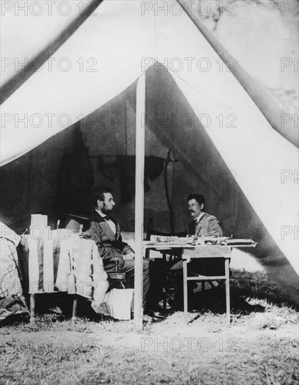 President Lincoln in General McClellan's tent after the Battle of Antietam, 1862. Artist: Unknown