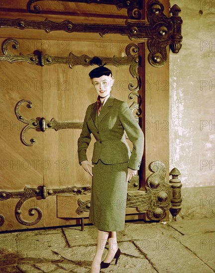 Female model shows a suit, the Historical Museum, Stockholm, 1950s. Artist: Göran Algård