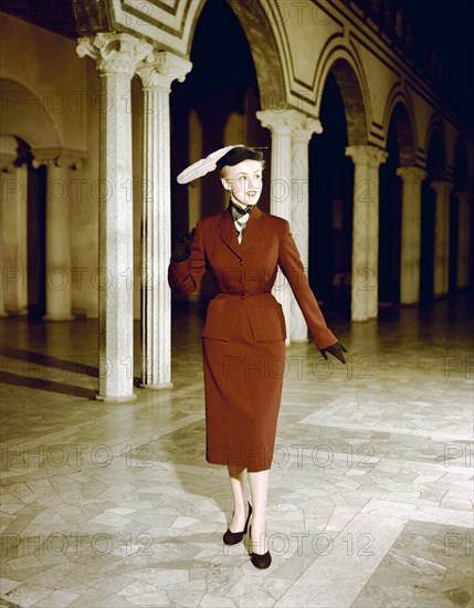 Female model shows a suit, the Historical Museum, Stockholm, 1950s. Artist: Göran Algård