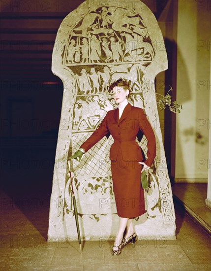 Female model shows a suit, the Historical Museum, Stockholm, 1950s. Artist: Göran Algård